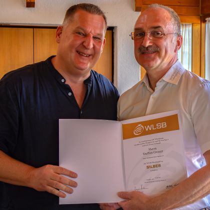 Ehrungsmatinee 2026 - Steffen Grauer erhält die WLSB-Ehrennadel in Silber von Matthias Müller (Sportkreis Ludwigsburg)